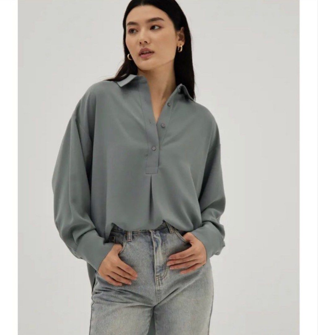 Love Bonito Relaxed Blouse (Blue Silver) (Category: Blouses) located in Cebu City. Submitted by cmy___ (Listing ID 1422656536, Image 1). Description: It’s a size small on the tag, runs very large though. it fits a medium to XL It’s a satin-like material, very classy Never wore this out just tried it on :) For orders outside Cebu city I I ship via J&T express.