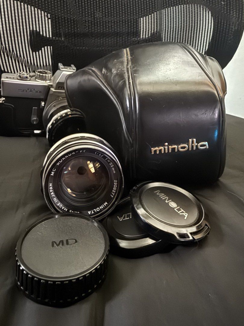 Minolta SRT 101 Film Camera (Category: Cameras) located in Malabon City. Submitted by gabbycart (Listing ID 1422625730, Image 3). Description: - No issues, used only 2x - Light meter working and still has battery Condition: Excellent working condition with some normal wear and tear. Includes: - Minolta MC Rokkor-PF 55mm f/1.7 lens - Sankyo Kohki W-Komura 28mm f/3.5 lens - Original Minolta case and lanyard - Extra lens caps.