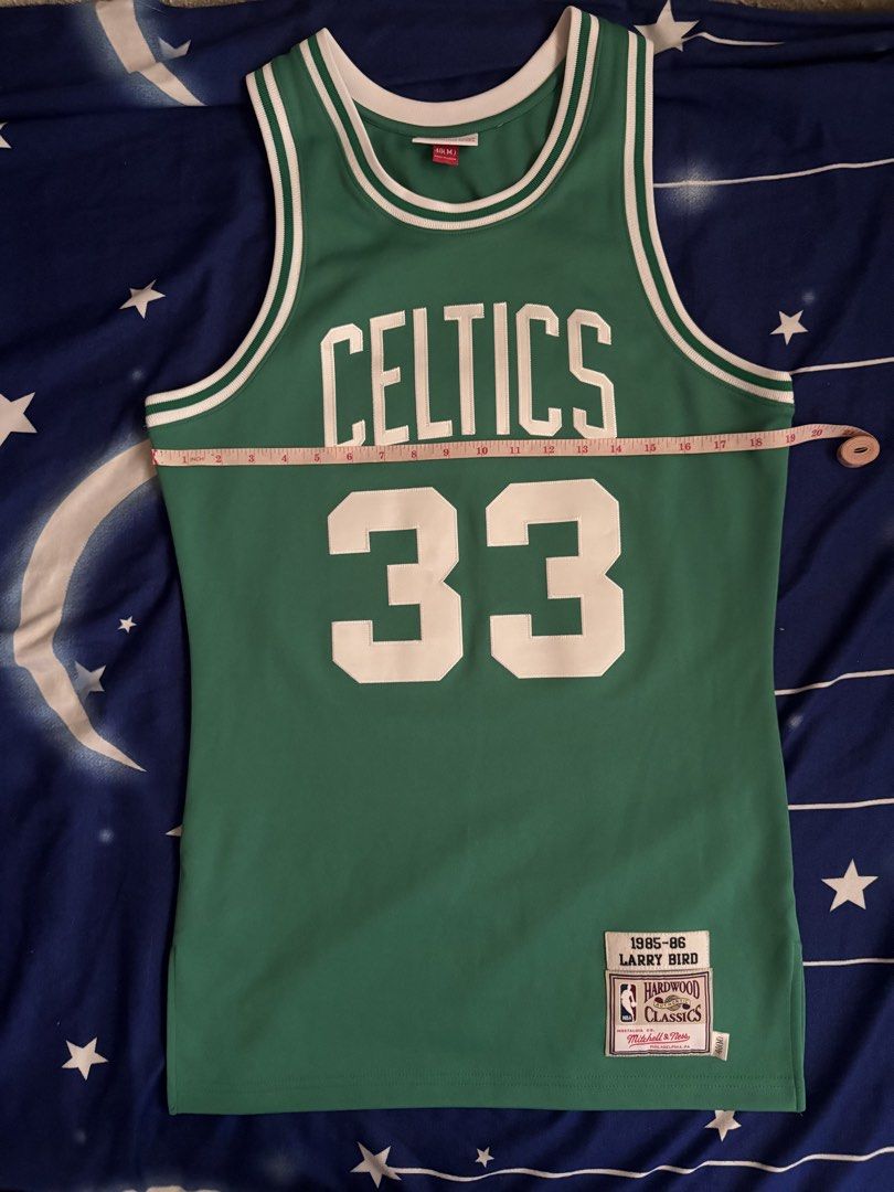 Mitchell & Ness Authentic Boston Celtics Larry Bird Jersey (Category: Activewear) located in Quezon City. Submitted by onlinedeclutterr (Listing ID 1422621346, Image 1). Description: - Authentic Mitchell & Ness Boston Celtics jersey - Features Larry Bird's name and number 33 - Classic green and white design - Size: M/L - From the 1985-86 season.