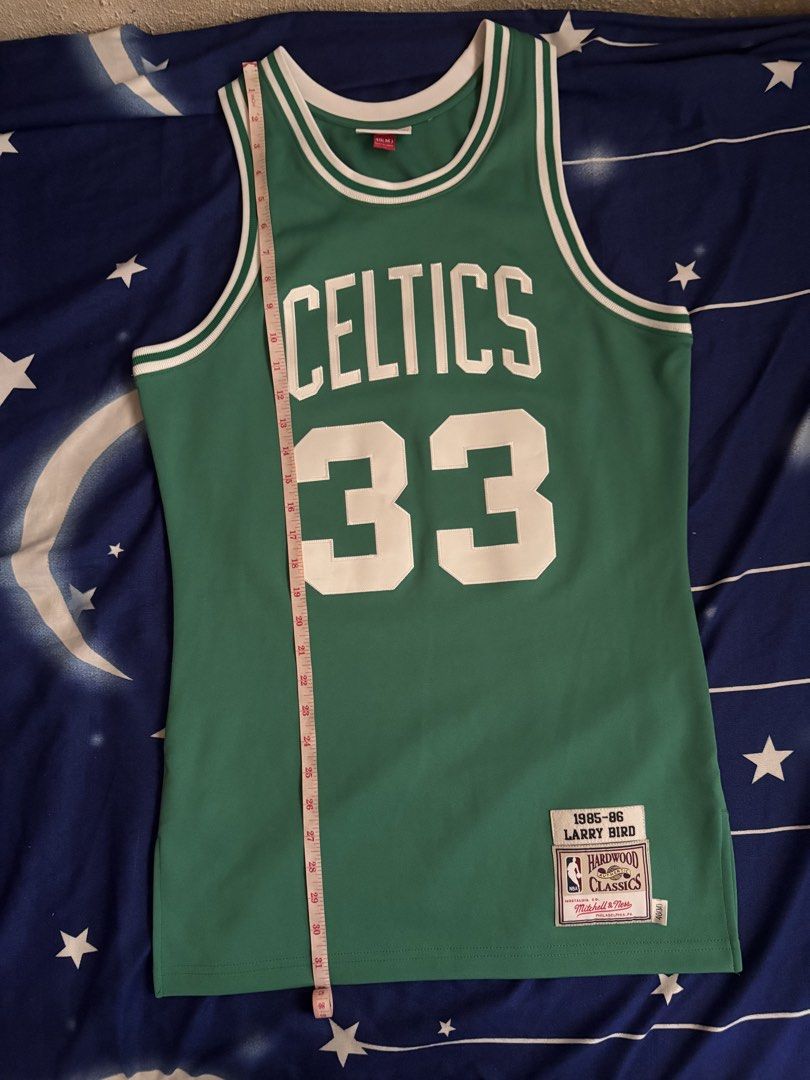 Mitchell & Ness Authentic Boston Celtics Larry Bird Jersey (Category: Activewear) located in Quezon City. Submitted by onlinedeclutterr (Listing ID 1422621346, Image 2). Description: - Authentic Mitchell & Ness Boston Celtics jersey - Features Larry Bird's name and number 33 - Classic green and white design - Size: M/L - From the 1985-86 season.