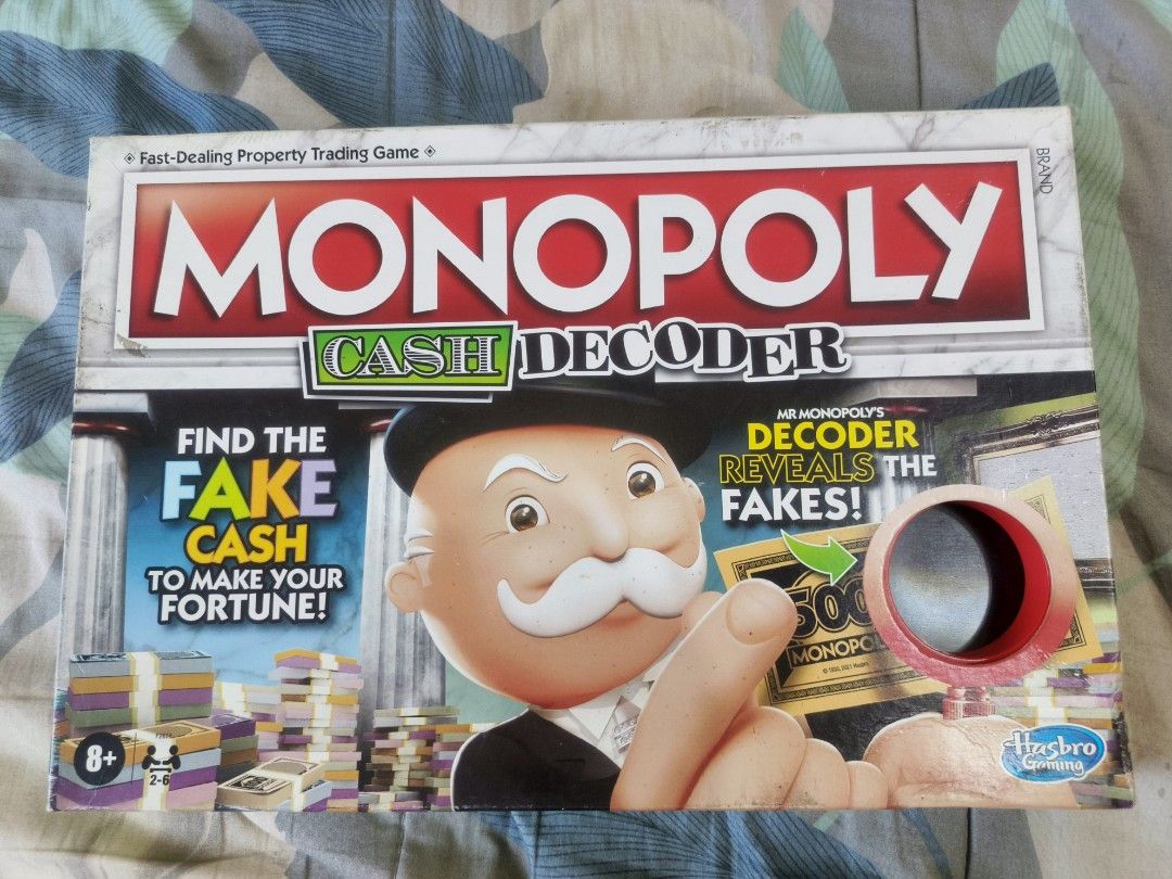 Monopoly Cash Decoder Board game (Category: Board Games & Puzzles) located in Consolacion. Submitted by mkb187 (Listing ID 1422581452, Image 1). Description: Monopoly Cash Decoder Selling for only 1500php 100% Complete includes a DIY cardboard compartment for storage played less than 10 times minor dents and scratches MOP: Gcash ‎delivery: J&T ‎ ‎If meet up. I'm only available through 3-7 P. M. (Weekdays) and ‎10A. M. --- 7P. M. (Weekends) ‎ ‎if 