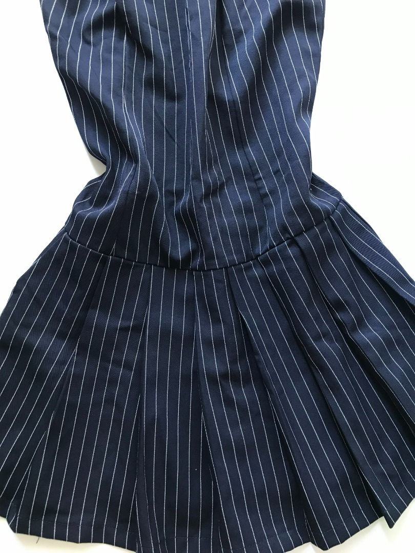 Navy Blue Striped Strapless Dress - Size S (Category: Dresses) located in Bulacan. Submitted by roomarchive (Listing ID 1422700314, Image 2). Description: - Navy blue strapless dress - Classic striped pattern - Fitted bodice with shirring at the back - Pleated skirt - Length: 23-24in - Size: S - Material: 95% polyester, 5% other materials - Made in China.