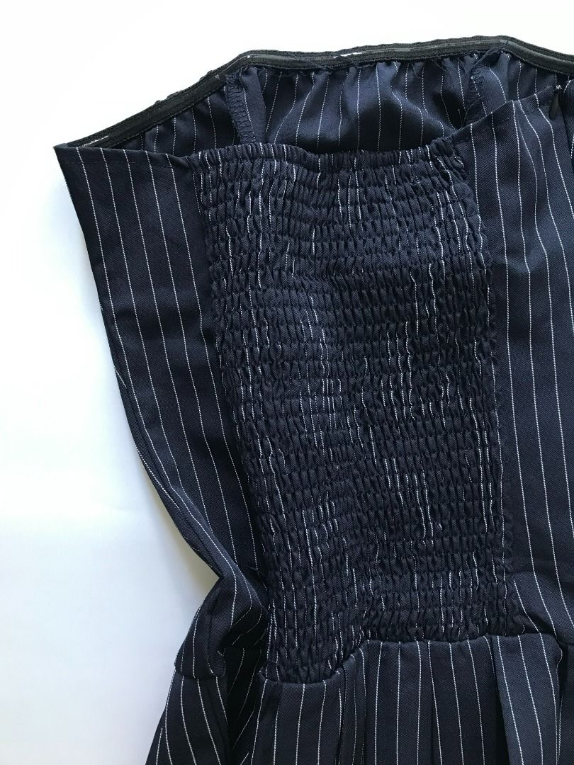 Navy Blue Striped Strapless Dress - Size S (Category: Dresses) located in Bulacan. Submitted by roomarchive (Listing ID 1422700314, Image 3). Description: - Navy blue strapless dress - Classic striped pattern - Fitted bodice with shirring at the back - Pleated skirt - Length: 23-24in - Size: S - Material: 95% polyester, 5% other materials - Made in China.