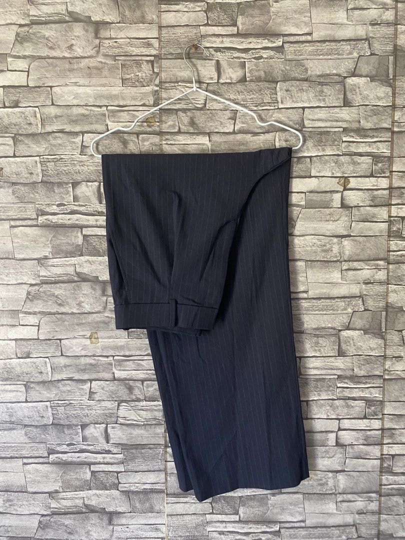 Navy Pinstripe Trousers (Category: Trousers) located in Lingayen. Submitted by ivansellstuff (Listing ID 1422668892, Image 1). Description: - Navy pinstripe trousers - Wide leg design - Pleated front - Button and zipper closure - Side pockets - Lightweight fabric.
