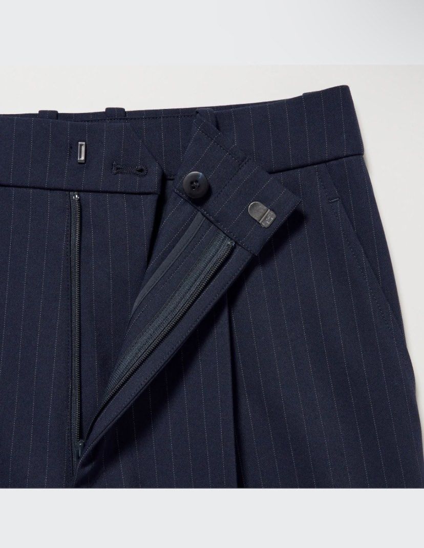 Navy Pinstripe Trousers (Category: Trousers) located in Lingayen. Submitted by ivansellstuff (Listing ID 1422668892, Image 2). Description: - Navy pinstripe trousers - Wide leg design - Pleated front - Button and zipper closure - Side pockets - Lightweight fabric.