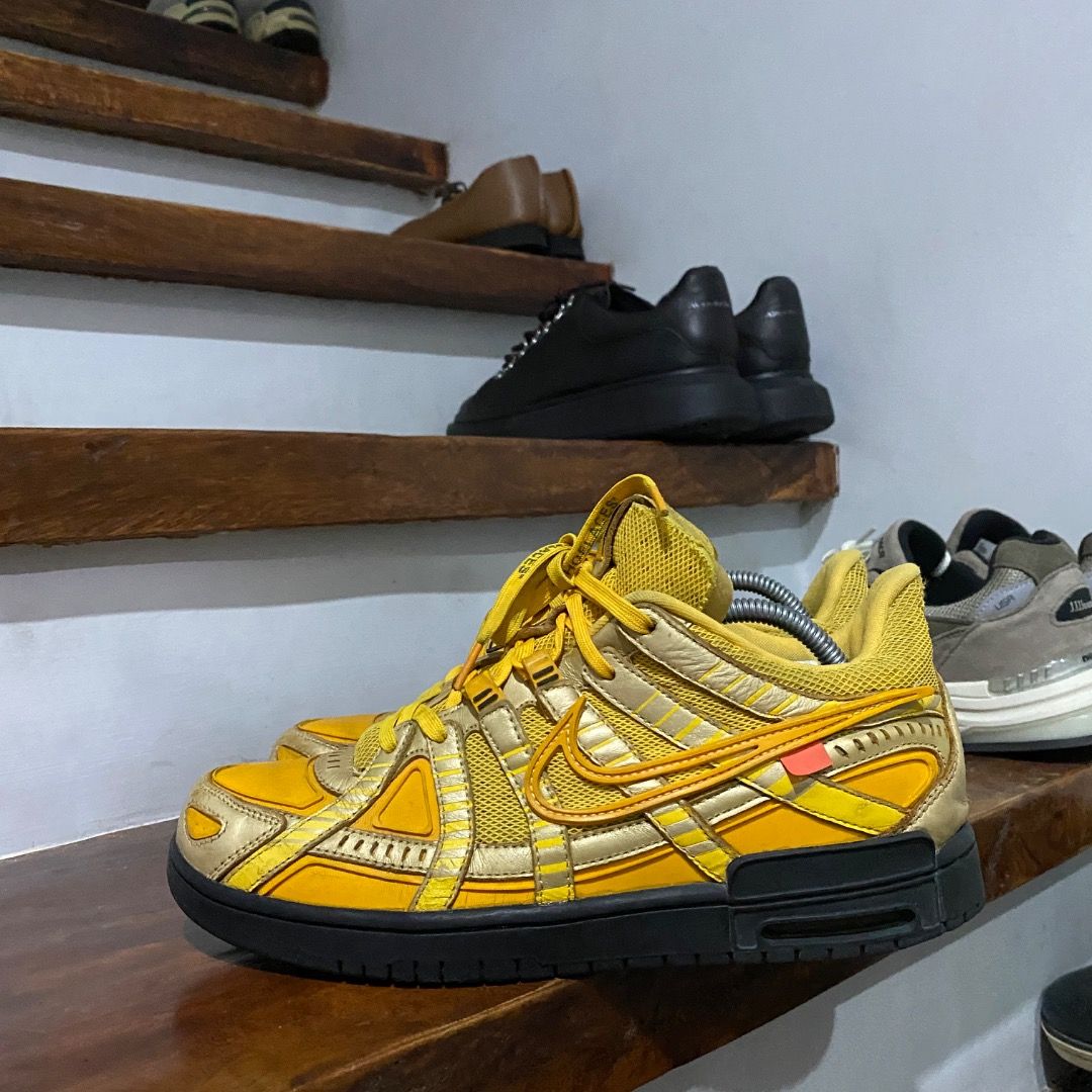 Nike Off-White Rubber Dunk 9.5 (Category: Sneakers) located in Antipolo. Submitted by bentakahitanoano (Listing ID 1422692548, Image 3). Description: Nike Air Rubber Dunk Off White University Gold Has been worn a lot with visible scuffs here and there and minor heel drag from regular use Still wearable and structurally intact Size 9.5US Condition Used condition with noticeable cosmetic wear but fully wearable A standout Off White collaboration pi