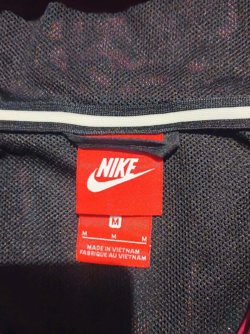 Nike Windrunner Jacket (Category: Coats, Jackets and Outerwear) located in Manila. Submitted by stro3rr1 (Listing ID 1422693415, Image 2). Description: 🌃 Nike Windrunner jacket - Size: Medium/Large - Color: Red and Navy color block - Features: Hood and full-length zipper - Design: Nike logo on the chest - Made in Vietnam 🌃 Gcash/pick up 🌃 Lalamove/J&T 🌃 Tondo Manila/Bulacan Sjdm.