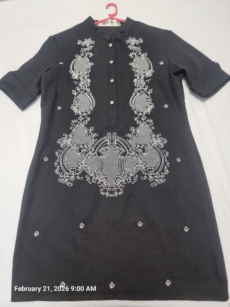 Nuevo Ystilo Embroidered Dress (Category: Dresses) located in Antipolo. Submitted by CharliesBox (Listing ID 1422569192, Image 1). Description: - Black dress with embroidered details - Mandarin collar - Button-down front - Short sleeves - Brand: Nuevo Ystilo - Size: M - Condition: Good.