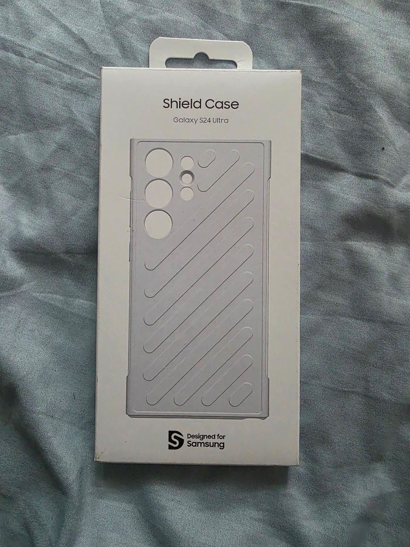 Original Shield Case (Category: Cases & Sleeves) located in Quezon City. Submitted by highonspotlight (Listing ID 1422603424, Image 1). Description: - Original Shield Case for Samsung Galaxy S24 Ultra - Stylish diagonal design - Designed for a perfect fit .