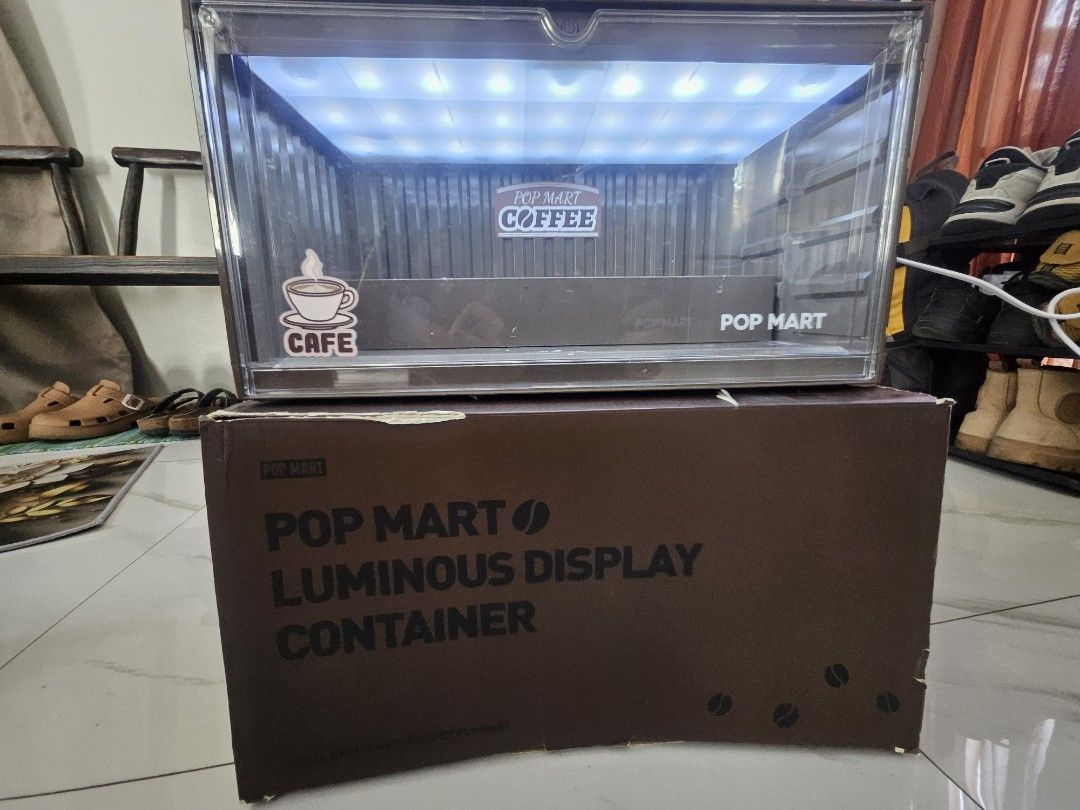 Pop Mart Luminous Display Container (Category: Storage Boxes & Baskets) located in Manila. Submitted by declutterhopper (Listing ID 1422612098, Image 1). Description: - Pop Mart Luminous Display Container - Coffee Shop Theme - Features a built-in light - Comes with original box - Designed for collectibles - Clear front panel for easy viewing.