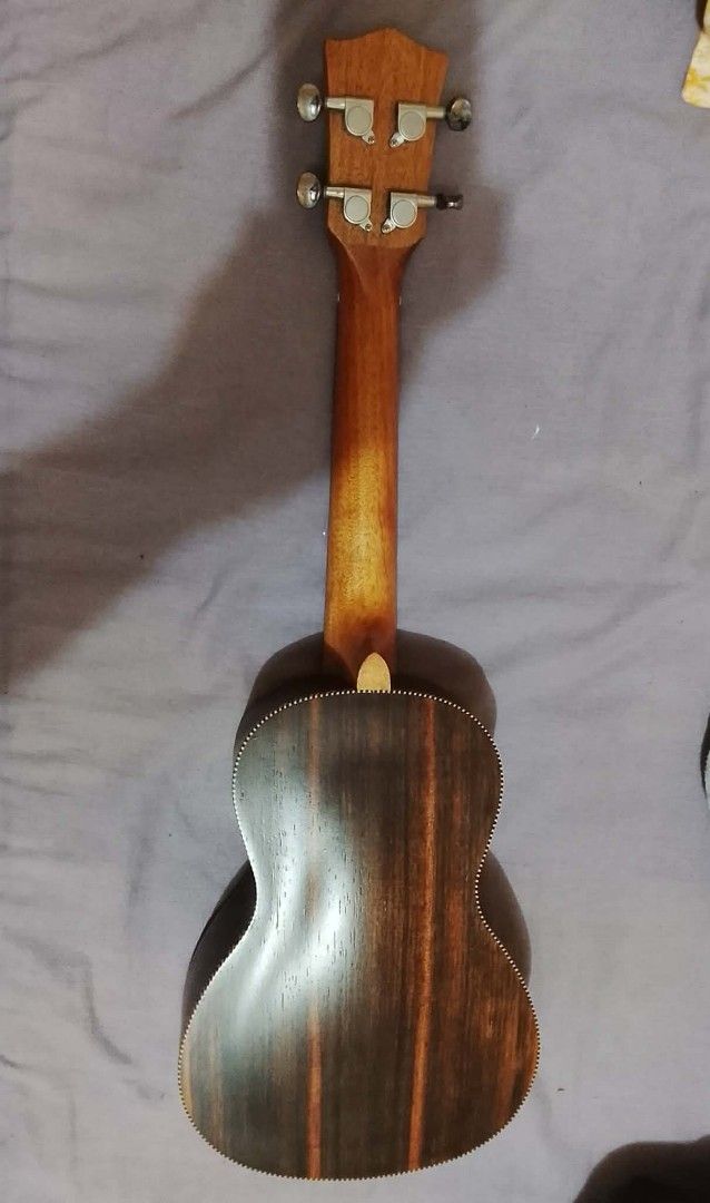 Pulse Ukulele (Category: Musical Instruments) located in Manila. Submitted by the_simple_things (Listing ID 1422657134, Image 2). Description: Pulse brand Concert Ukulele. Ovation style design. With free Acouway carrying case. Very good condition. Like new. Original price when bought was 2k.