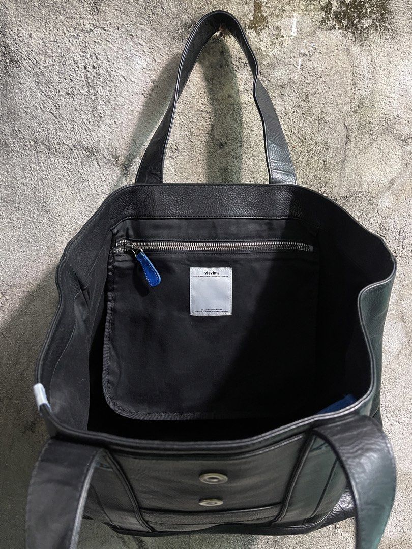 Rare Visvim Homer Tote Bag Leather (Category: Luxury Bags & Wallets) located in Manila. Submitted by thevintage90_sretro. (Listing ID 1422646642, Image 3). Description: visvim Homer Tote, specifically a version crafted from vegetable-tanned leather. It is a refined leather tote designed with a large storage capacity and a supple leather finish. Key Features Material: Premium vegetable-tanned (veggie) cowhide or horsehide leather. Design: Features