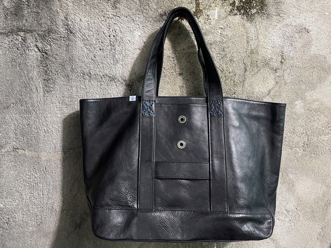 Rare Visvim Homer Tote Bag Leather (Category: Luxury Bags & Wallets) located in Manila. Submitted by thevintage90_sretro. (Listing ID 1422646642, Image 1). Description: visvim Homer Tote, specifically a version crafted from vegetable-tanned leather. It is a refined leather tote designed with a large storage capacity and a supple leather finish. Key Features Material: Premium vegetable-tanned (veggie) cowhide or horsehide leather. Design: Features