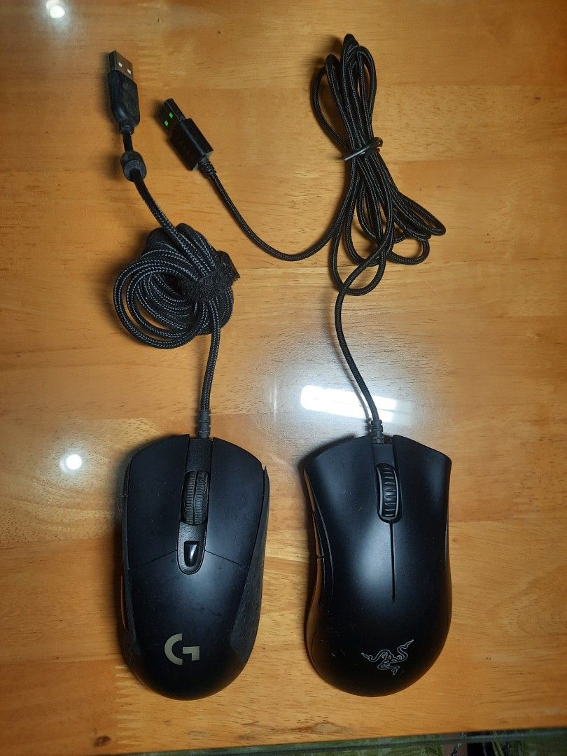 Razer DeathAdder Essential & Logitech G403 (Category: Mouse & Mousepads) located in Bulacan. Submitted by nice.finds (Listing ID 1422675967, Image 1). Description: - Razer DeathAdder Essential and Logitech G403 gaming mice for sale. - Both are wired and black. - Razer DeathAdder Essential: Razer logo on top, model name on the bottom. - Logitech G403: Logitech logo on top, model name on the bottom. - Both have USB connectors..