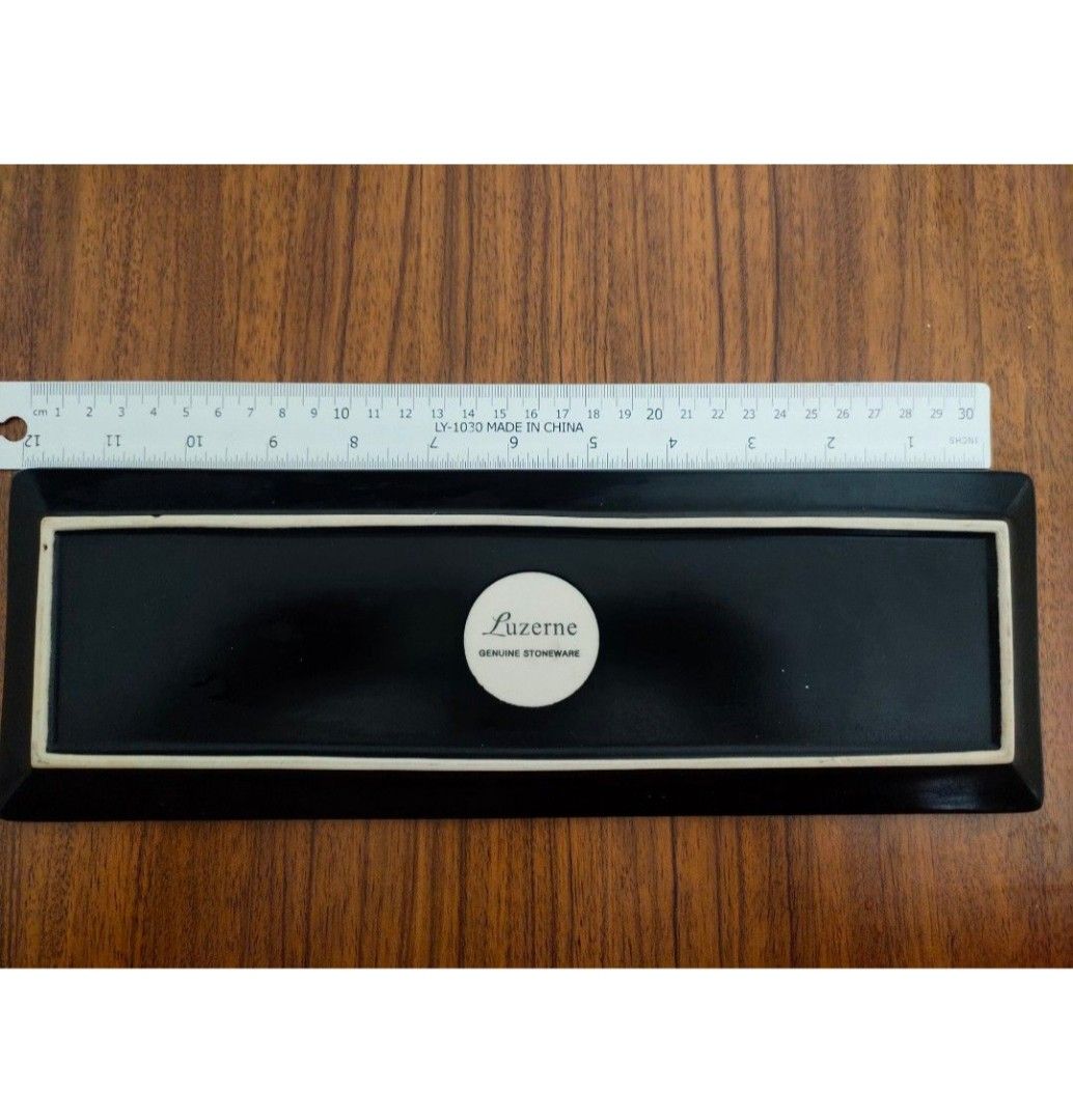 Rectangular ceramic plate (Category: Other Kitchenware & Tableware) located in Singapore. Submitted by song867411888 (Listing ID 1422683395, Image 1). Description: black ceramic plate, very lightly used, good for restaurant and cafe platting use. I've total 22pcs.