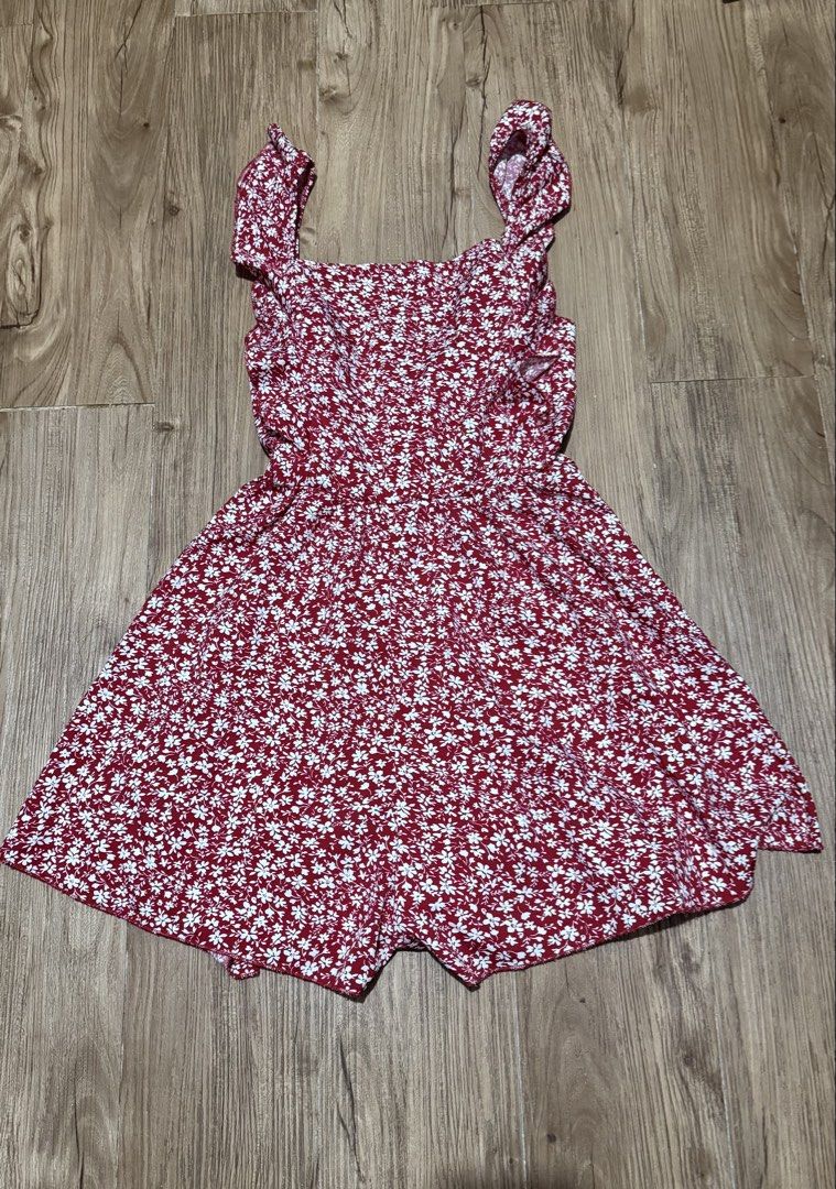 SHEIN Floral Romper with Ruffle Sleeves (Category: Rompers) located in Manila. Submitted by threshold01 (Listing ID 1422660347, Image 3). Description: -Used once -Romper, adjustable tie at the back -Floral red.