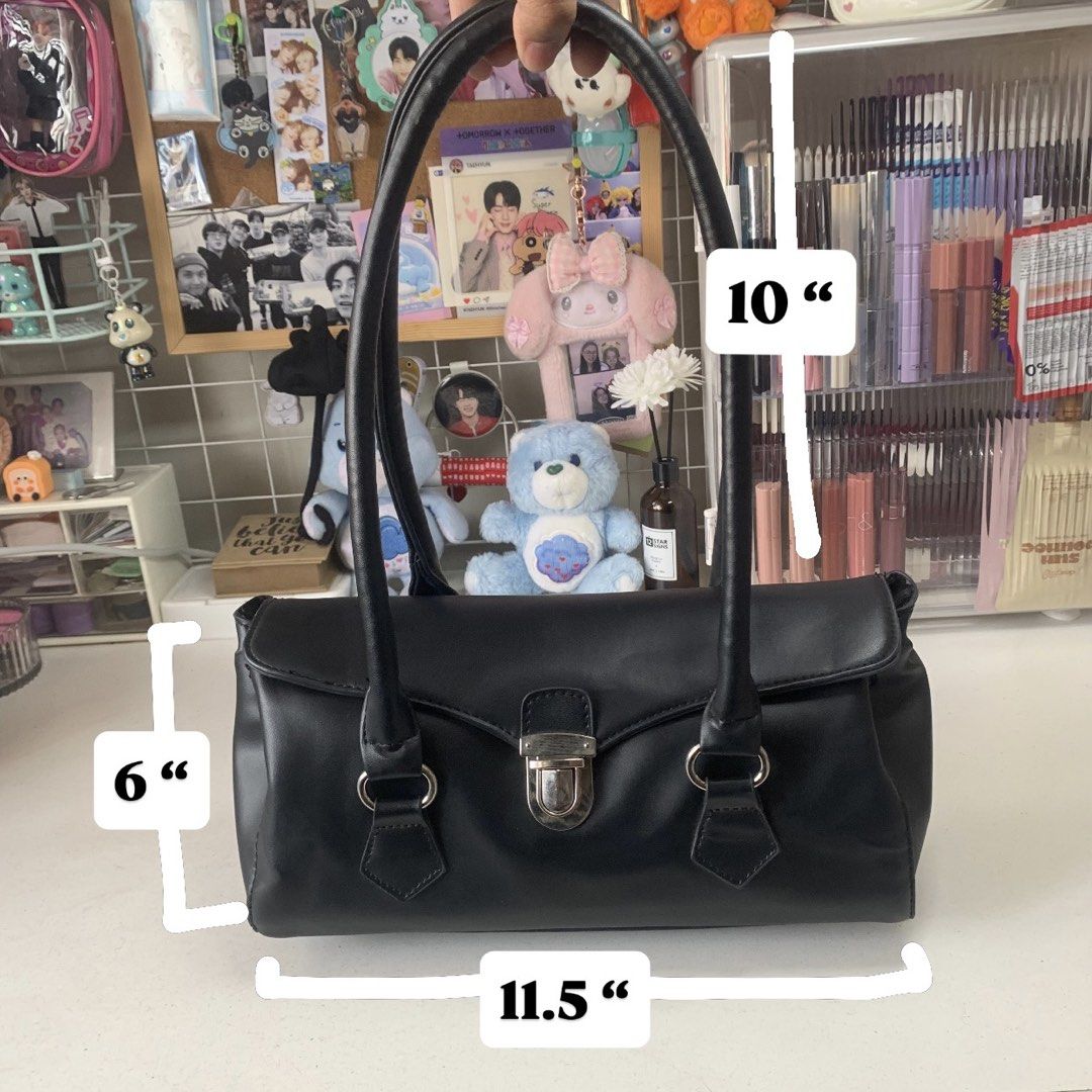 Shoulder Bag (Category: Shoulder Bags) located in Quezon City. Submitted by breadjinniecheeks (Listing ID 1422640957, Image 2). Description: - Black rectangular shoulder bag - Silver clasp closure - Two handles - Back zippered pocket - Spacious interior - Dimensions: 11.5" length, 6" height, 10" handle drop - From Korea - Never used! Stored after buying.