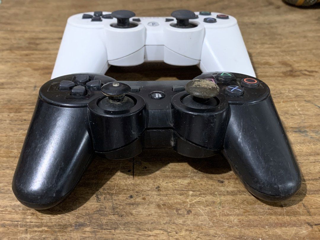 Sony PlayStation 3 DualShock 3 Controller (Category: Controllers) located in Manila. Submitted by miah_collectiblesurplus (Listing ID 1422688081, Image 2). Description: 380 pesos set Location: Valenzuela -selling as is untested pang parts or baka magamit nyo pa - Two Sony PlayStation 3 DualShock 3 wireless controllers - One white controller - One black controller .
