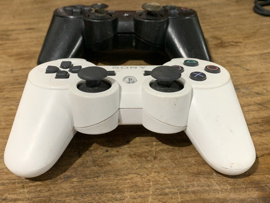 Sony PlayStation 3 DualShock 3 Controller (Category: Controllers) located in Manila. Submitted by miah_collectiblesurplus (Listing ID 1422688081, Image 3). Description: 380 pesos set Location: Valenzuela -selling as is untested pang parts or baka magamit nyo pa - Two Sony PlayStation 3 DualShock 3 wireless controllers - One white controller - One black controller .