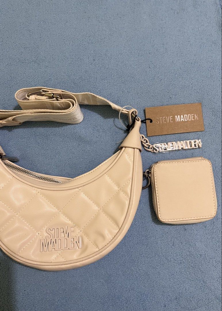 Steve Madden Tapioca Bandre 2 Shoulder Bag (Category: Shoulder Bags) located in Bulacan. Submitted by strawbei.ri (Listing ID 1422708101, Image 2). Description: - OG Price: $68 (~Php 3900) - Color: Tapioca (cream) - Includes matching coin purse - Zipper closure - Adjustable strap - Original tag attached.