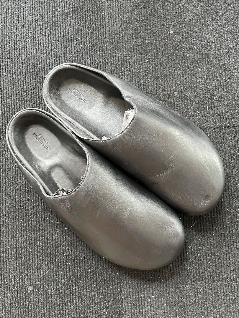 Studio Nicholson Black Sandals Size 43 (Category: Flats & Sandals) located in Davao. Submitted by twistedswagger (Listing ID 1422553556, Image 2). Description: - Studio Nicholson Clogs - Size 43 - Textured soles - Brand name visible on insole.