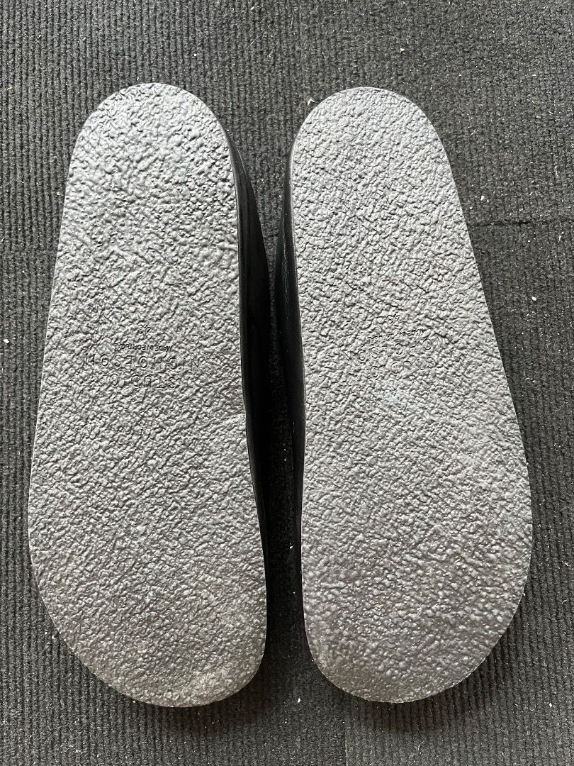 Studio Nicholson Black Sandals Size 43 (Category: Flats & Sandals) located in Davao. Submitted by twistedswagger (Listing ID 1422553556, Image 3). Description: - Studio Nicholson Clogs - Size 43 - Textured soles - Brand name visible on insole.