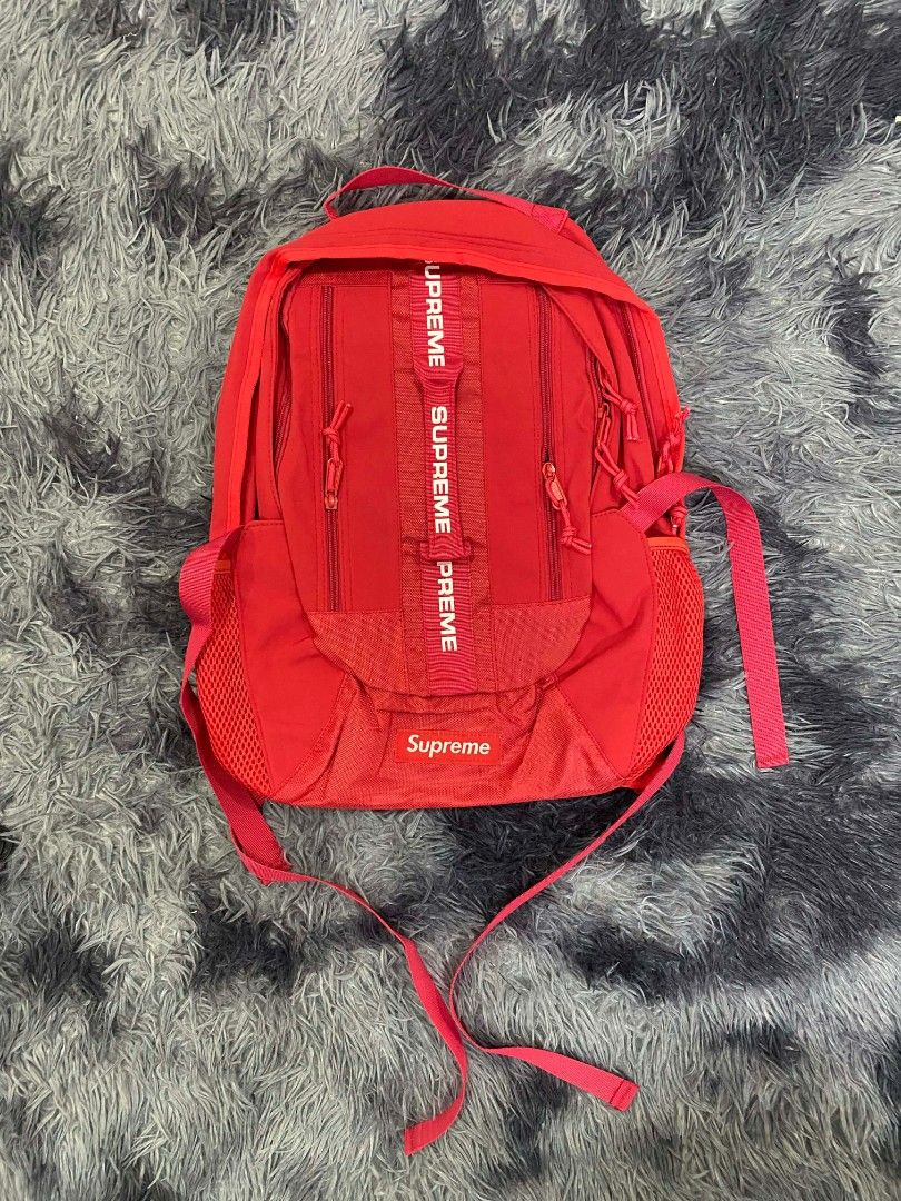 Supreme Backpack (Category: Backpacks) located in Manila. Submitted by l.amnlgarments (Listing ID 1422652181, Image 2). Description: - Supreme backpacks in multiple colors - Features: - Main compartment - Side pockets - Adjustable straps - Some with Supreme logo - Some with drawstring closure - Some with tags attached.