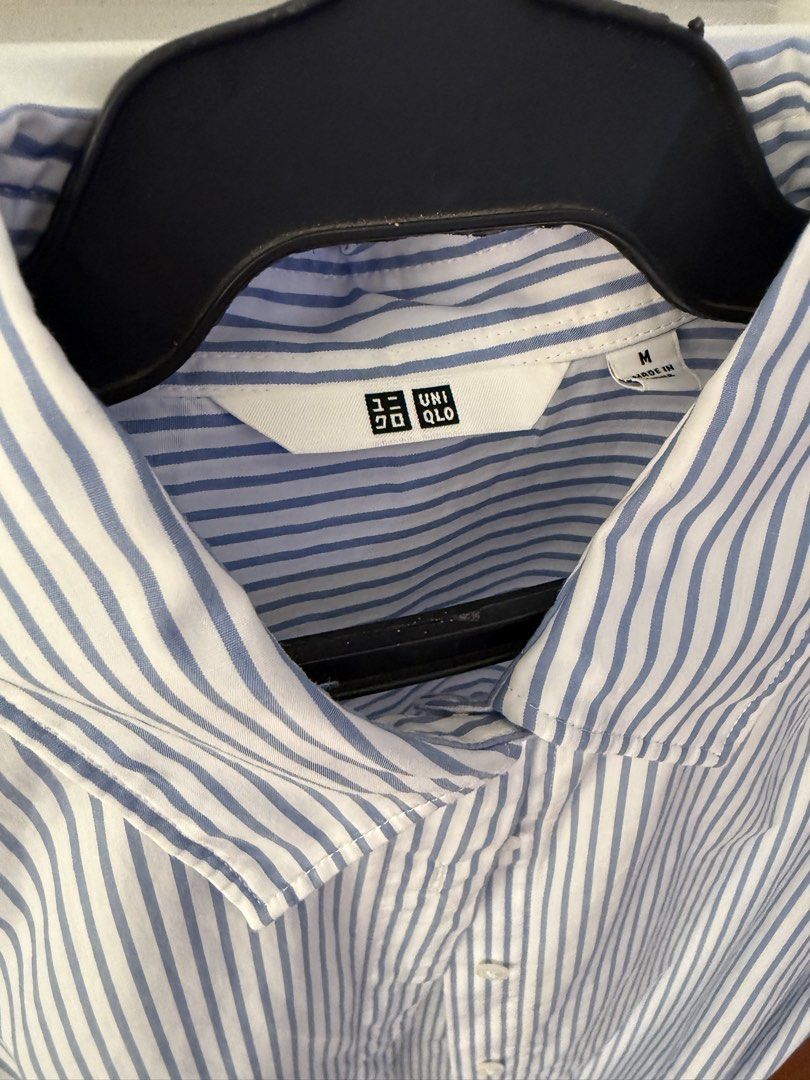 Uniqlo Striped long sleeves (Category: Longsleeves) located in Makati City. Submitted by larcie (Listing ID 1422567853, Image 3). Description: - Uniqlo striped shirt - Color: Blue and white - Size: Medium - Features: Collared neckline, long sleeves with buttoned cuffs - Closure: Button-down -still looks brand new, used only once.
