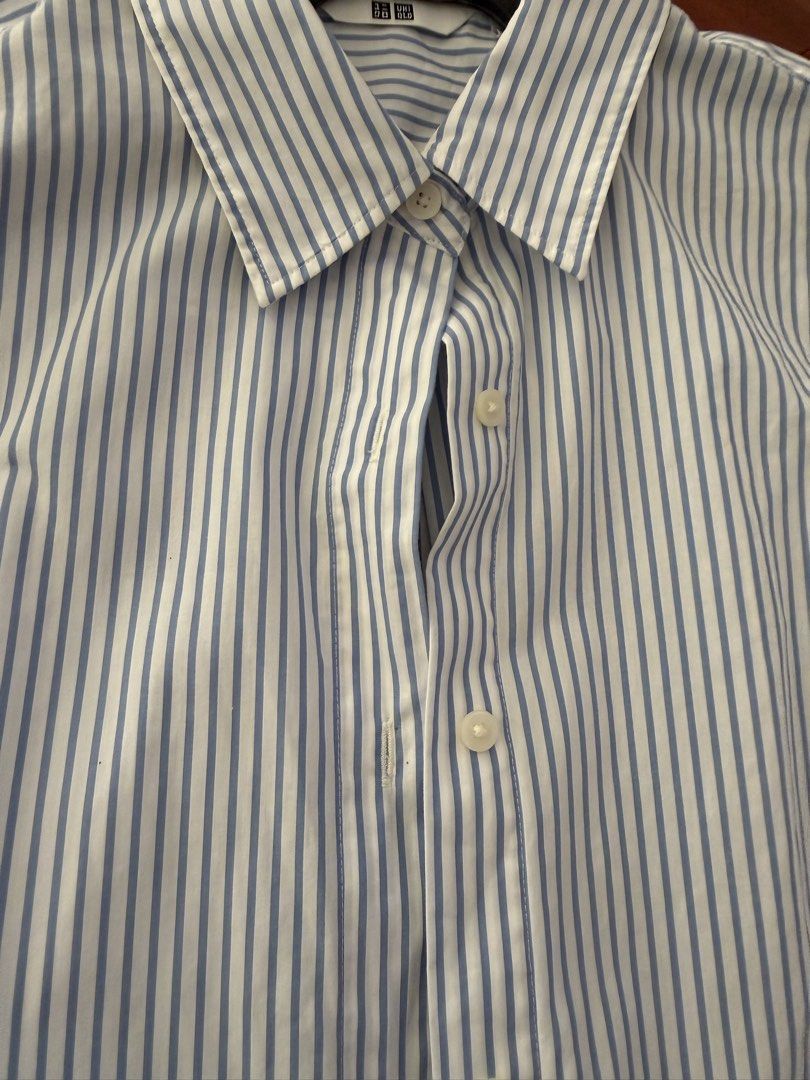 Uniqlo Striped long sleeves (Category: Longsleeves) located in Makati City. Submitted by larcie (Listing ID 1422567853, Image 2). Description: - Uniqlo striped shirt - Color: Blue and white - Size: Medium - Features: Collared neckline, long sleeves with buttoned cuffs - Closure: Button-down -still looks brand new, used only once.