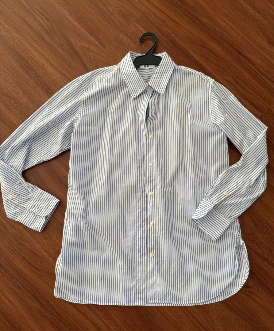 Uniqlo Striped long sleeves (Category: Longsleeves) located in Makati City. Submitted by larcie (Listing ID 1422567853, Image 1). Description: - Uniqlo striped shirt - Color: Blue and white - Size: Medium - Features: Collared neckline, long sleeves with buttoned cuffs - Closure: Button-down -still looks brand new, used only once.
