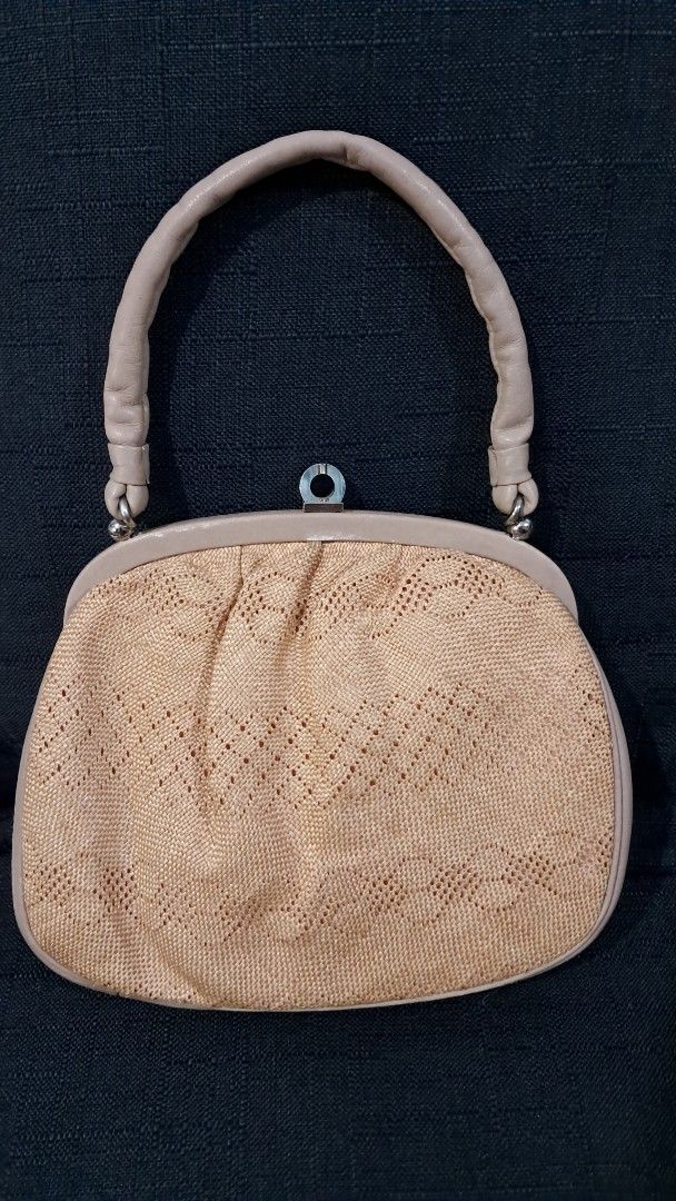 Vintage Leather Beige Handbag with Handle (Category: Luxury Bags & Wallets) located in Cavite. Submitted by jp477 (Listing ID 1422549256, Image 1). Description: - Vintage LEATHER beige woven handbag - Clasp closure - Beige leather trim - Interior zippered pocket - Compartment for essentials - Decorative front pattern See pictures for the slight flaws. Interior..no issue. - Stylish accessory.