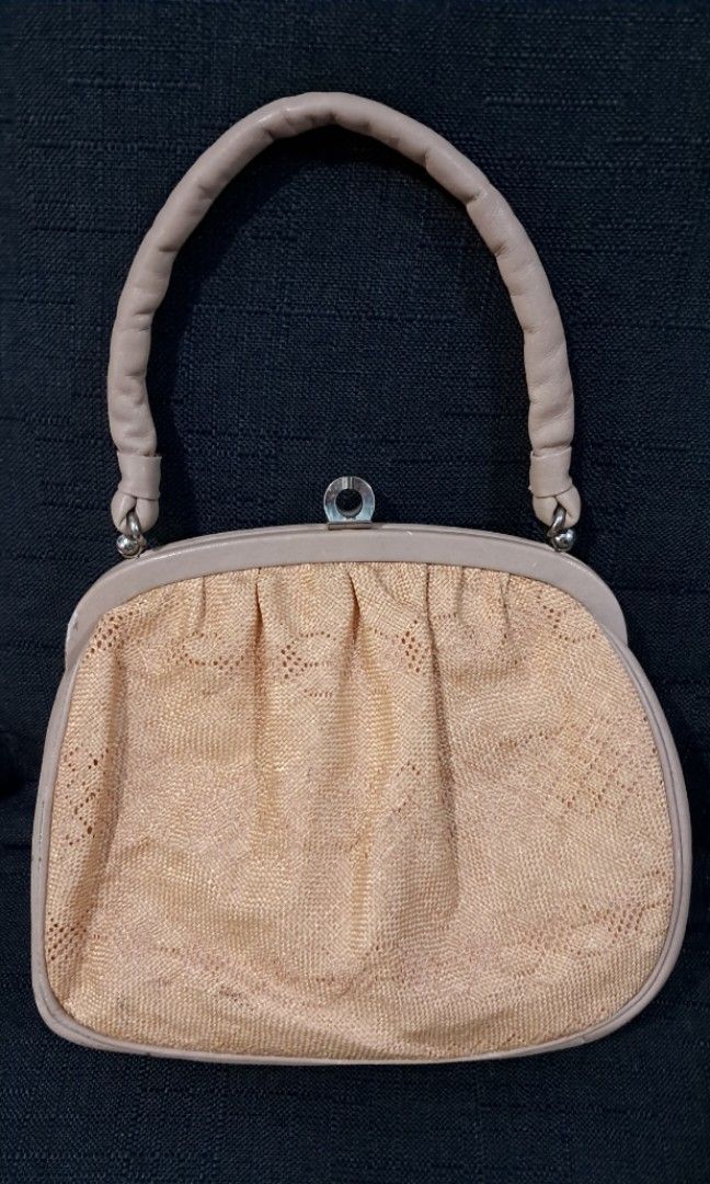 Vintage Leather Beige Handbag with Handle (Category: Luxury Bags & Wallets) located in Cavite. Submitted by jp477 (Listing ID 1422549256, Image 2). Description: - Vintage LEATHER beige woven handbag - Clasp closure - Beige leather trim - Interior zippered pocket - Compartment for essentials - Decorative front pattern See pictures for the slight flaws. Interior..no issue. - Stylish accessory.