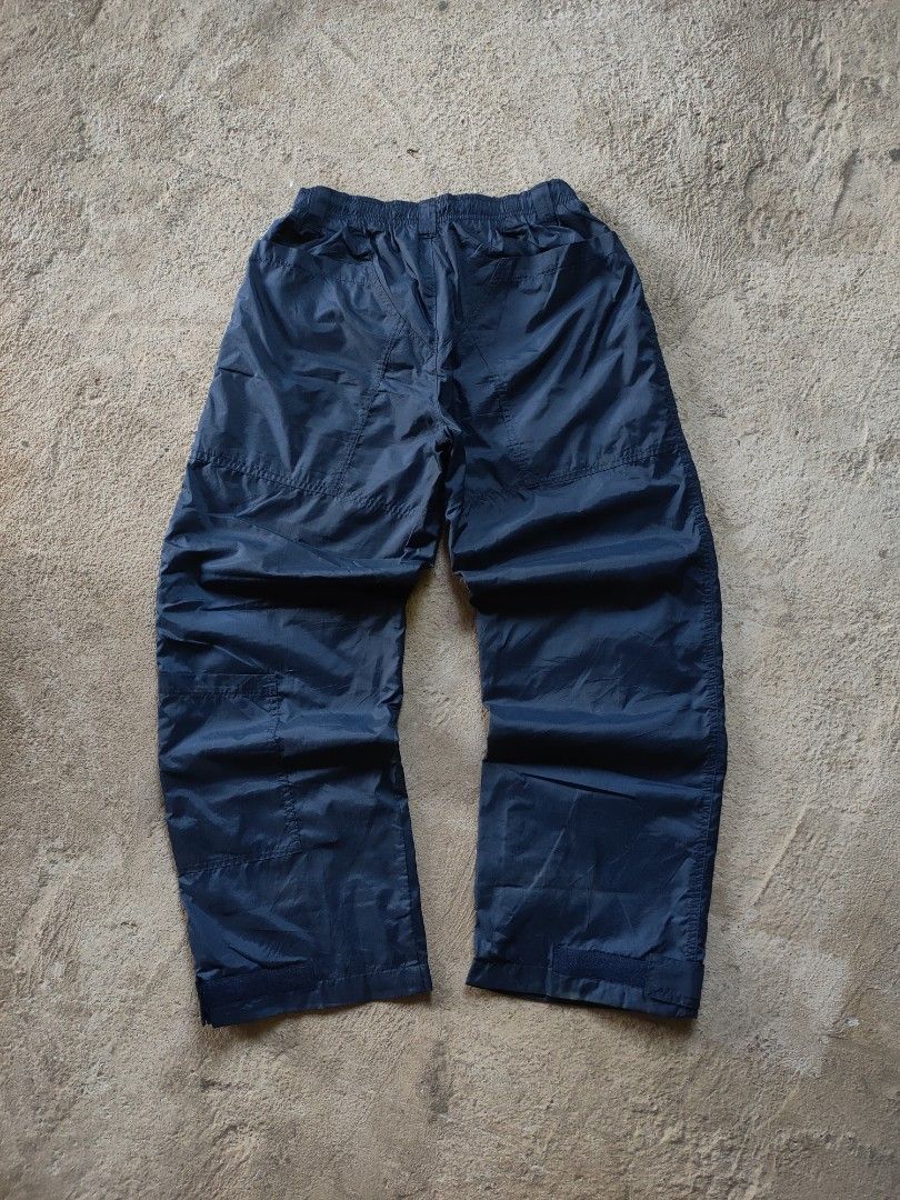 Vintage Nike Navy Blue Track Pants (Category: Joggers) located in Tumauini. Submitted by ken_thrift (Listing ID 1422688169, Image 2). Description: VINTAGE NIKE TRACK PANTS Waistline 27-34 Length 27 issue ❌ Likenew condition Color rate 9.8/10 Price 📥📥.