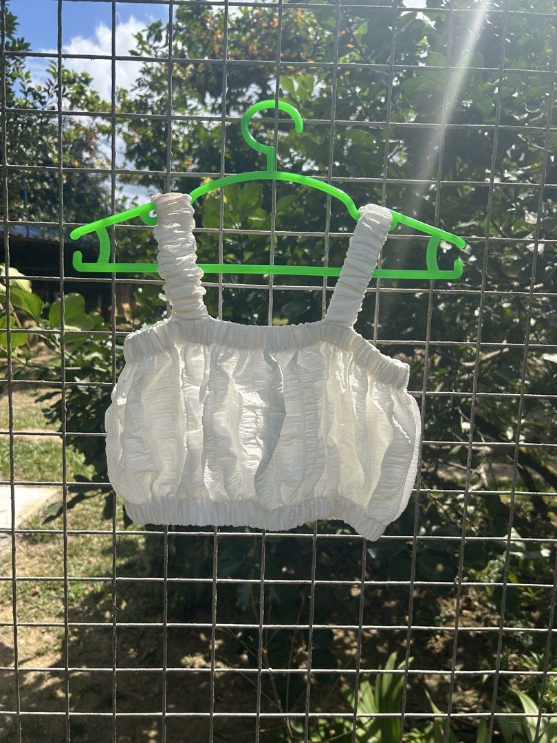 White Textured Crop Top and Skirt Set (Category: Sets or Coordinates) located in Antipolo. Submitted by yuriwanders (Listing ID 1422606230, Image 1). Description: - White crop top and skirt set - Crop top with gathered strap and bodice design - Skirt features a tiered, flowing design - Made of lightweight fabric - Ideal for casual outings - Perfect for warm weather.