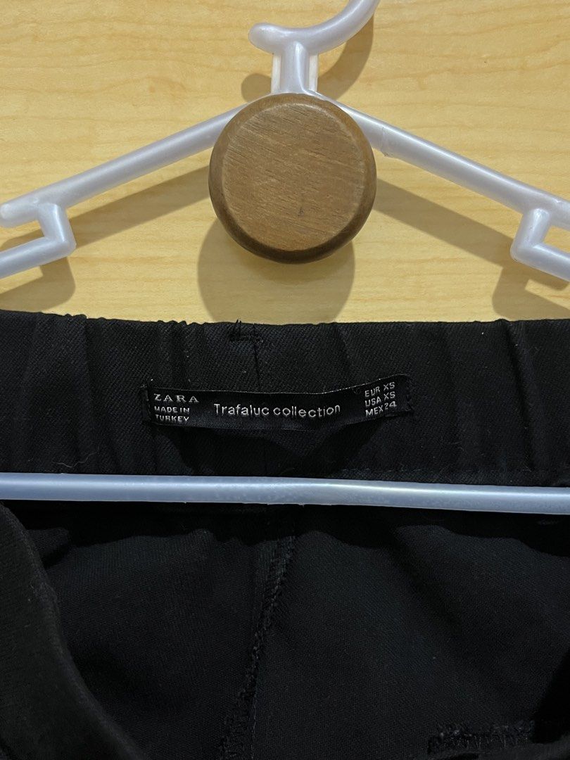 Zara Trafaluc Black Pants with White Stripe (Category: Other Bottoms) located in San Juan, La Union. Submitted by mirrorball27 (Listing ID 1422669502, Image 3). Description: ✨ PLEASE READ BEFORE ORDERING ✨ Item Details: Zara Trafaluc black pants with white side stripes. Size XS. Elastic waistband. Made in Turkey. Features two back pockets. ✔️ Actual photos posted ✔️ “When worn” photos/videos will be sent upon request 📦 Shipping Details • Shippin