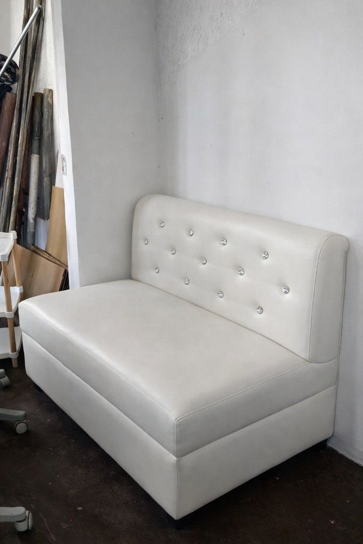 2 Seat White Sofa with Crystal Buttons (Category: Sofas) located in Caloocan City. Submitted by mommymoon71 (Listing ID 1422809922, Image 1). Description: - Elegant white sofa - Tufted back with crystal-like buttons - Clean, modern design - Smooth, leather-like material - Slightly curved backrest - Ideal for small spaces or accent use - Pure Leather - Custom Made.