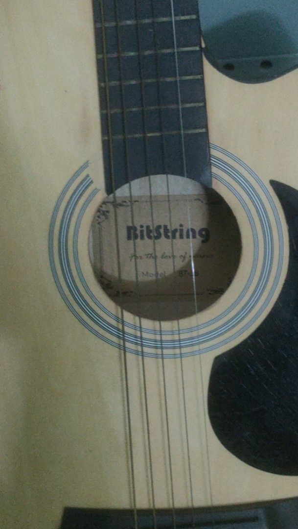 Acoustic Guitar Bitstring (with Freebies) (Category: Musical Instruments) located in Quezon City. Submitted by 1kavi (Listing ID 1422829798, Image 3). Description: Will include a free pick, small guitar bag, and allen wrench. Flaws: Konting gasgas sa likod. Strings are old, you can replace them. Still sounds & plays like new. RFS: I have a new guitar now. Only used this for few months, got gifted a better guitar and never used it again. (Stored) 