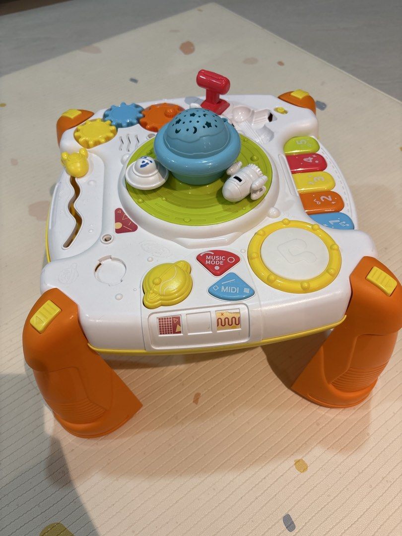 Activity Table (Category: Infant Playtime) located in Singapore. Submitted by livingonsunshine (Listing ID 1422844763, Image 1). Description: This activity table is at the perfect sitting height, so our little one’s back is well-supported and not slouching like taller tables. When used at the right developmental milestone, it really helps accelerate growth, building core and back strength while encouraging upright sitting. Playtime is both fun an