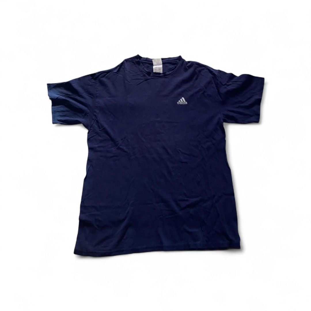 Adidas Navy Blue T-shirt (Category: Tshirts & Polo Shirts ) located in Pasig City. Submitted by sheesh_thrifting (Listing ID 1422756568, Image 1). Description: adidas trash condi fraying neckline pinholes .