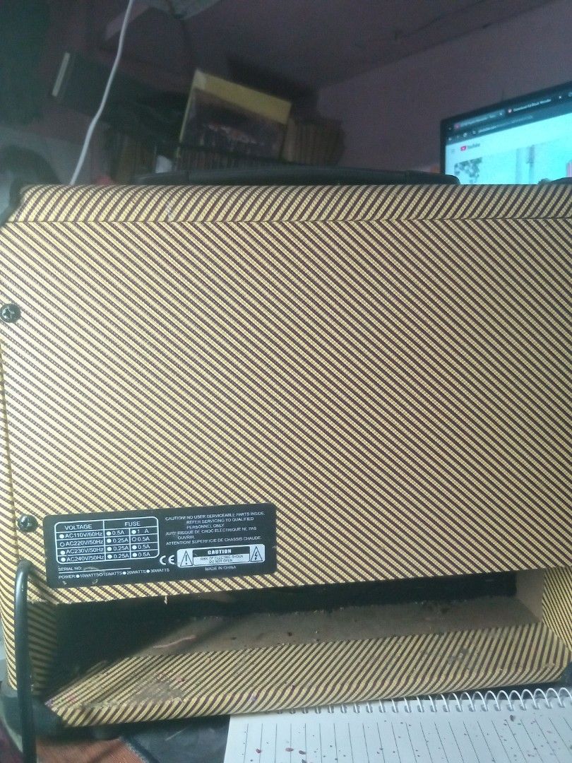 AG-15 Guitar Amplifier (Category: Musical Instruments) located in Paranaque City. Submitted by chechein_shop (Listing ID 1422812206, Image 2). Description: - AG-15 guitar amplifier - Input, Gain, Volume, Treble, Middle, Bass, and Phones controls - Power switch included - Black speaker cover - Tan-colored frame.