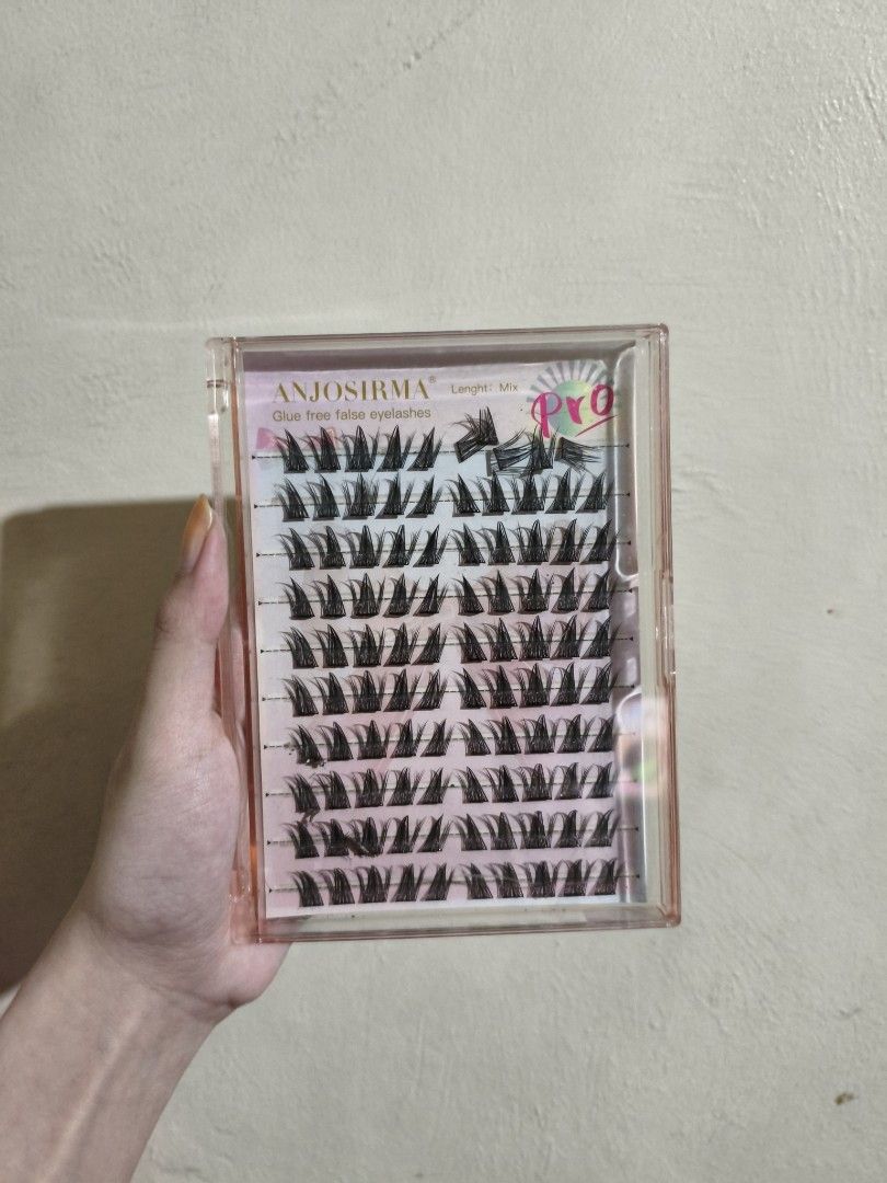 ANJOSIRMA & Glamorous Me Cluster Lashes (Category: Makeup) located in Mandaluyong City. Submitted by aeurea (Listing ID 1422852768, Image 1). Description: - First row only used. Will throw used lashes away after ordered. (They're not super used kasi, only tried them on once so left them there muna but decided to just sell them because they don't fit my eye shape.) - No need for glue. May adhesive na siya..