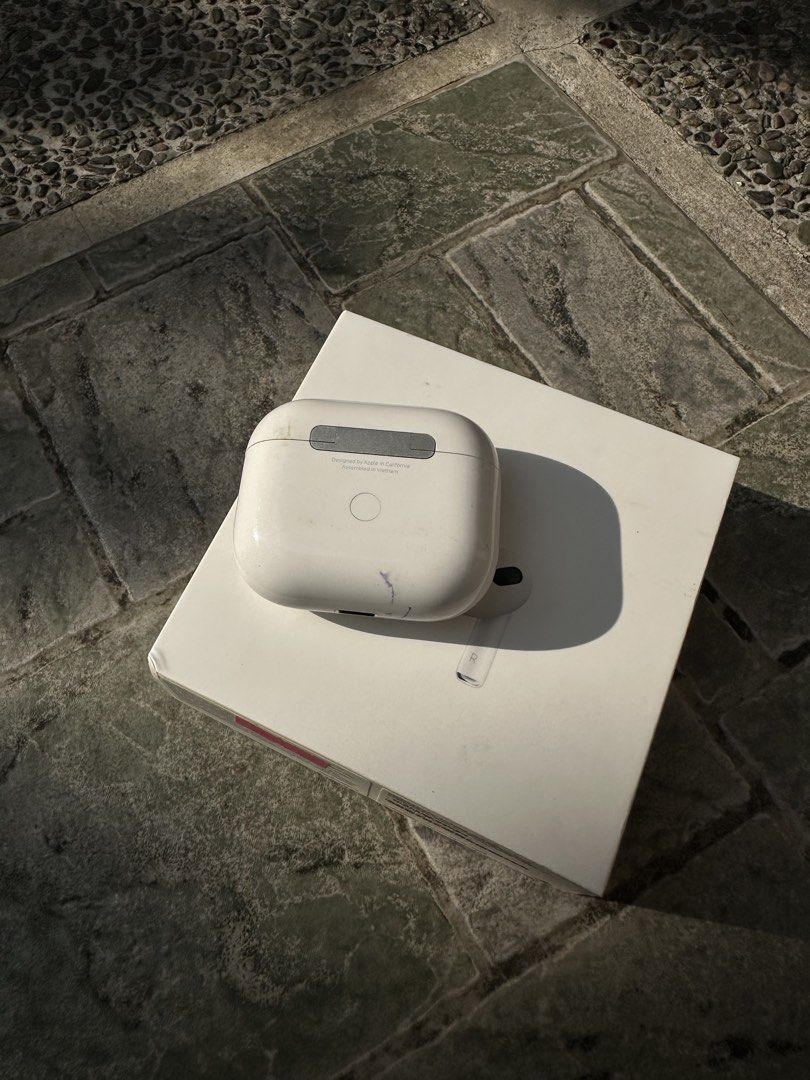 Apple AirPods 3rd Generation (Category: Earphones) located in Manila. Submitted by liladivert (Listing ID 1422787221, Image 2). Description: - AirPods 3rd Generation - Includes: Charging Case, Original Box - Color: White - Condition: Good - Features: Authentic Apple product - Note: Charging Case Only!! - Issue: Ink stain, Scratches.