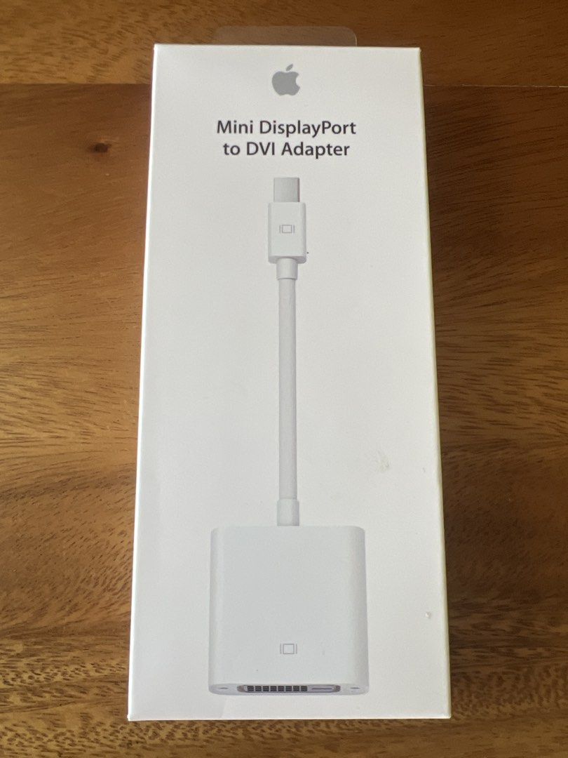 Apple Mini DisplayPort to DVI Adapter (Category: Cables & Adaptors) located in Taguig. Submitted by joe.olx (Listing ID 1422775590, Image 1). Description: - Apple Mini DisplayPort to DVI Adapter - Connects devices with Mini DisplayPort to DVI displays. - Color: White - Comes in original Apple packaging. - Designed for Apple products. - Packaging clearly shows adapter and connection types..