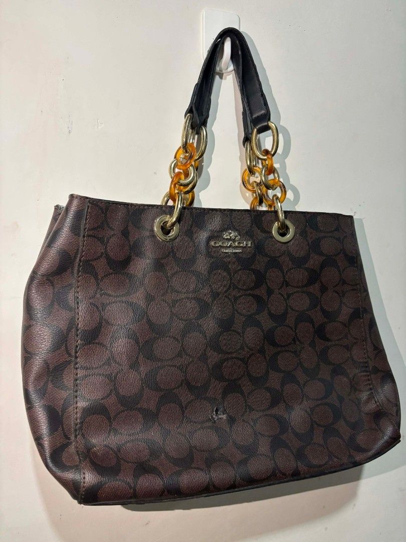 Authentic Coach Signature Leather Monogram Handbag (Category: Luxury Bags & Wallets) located in Naga. Submitted by hubthrift (Listing ID 1422868888, Image 2). Description: AUTHENTIC One Dot Burn Issue.