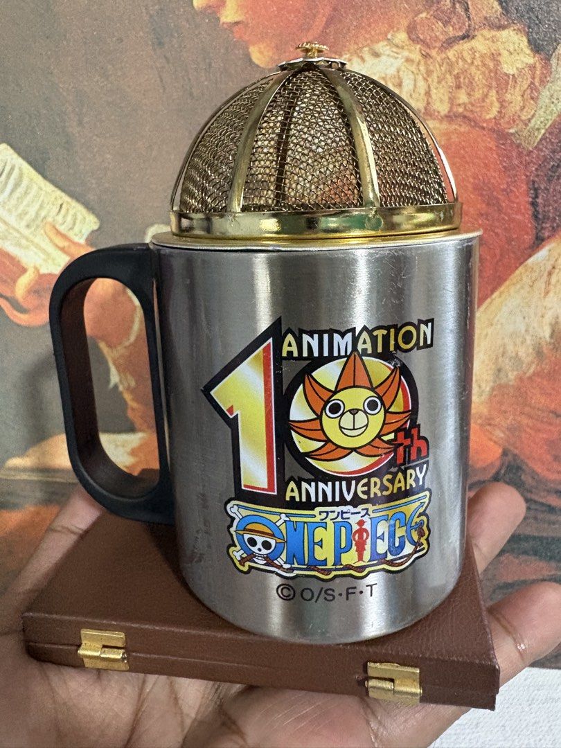 Authentic One Piece 10th Anniversary Mug (Category: Coffee & Tea Tableware) located in Mangaldan. Submitted by thriflip_online_shop (Listing ID 1422733922, Image 2). Description: AUTHENTIC One Piece 10th Anniversary Animation Stainless Steel Mug Rare Collector’s Item (Circa 2009) Own a piece of Pirate History! This is the official 10th Anniversary Animation commemorative mug, released over 15 years ago to celebrate the first decade of the One Pie