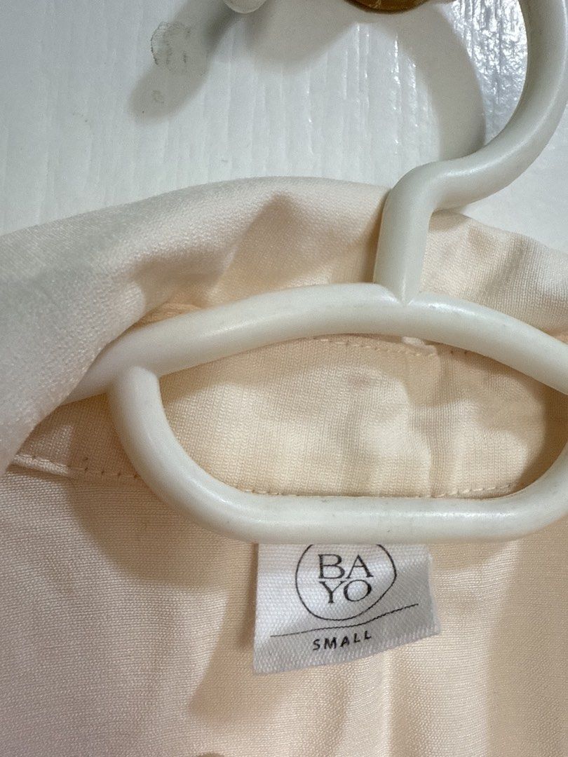 Bayo Embroidered Shirt - Small (Category: Shirts) located in Pasig City. Submitted by pupperiedoo (Listing ID 1422753009, Image 2). Description: - Bayo cream-colored shirt - Size: Small - Features an embroidered design - Short sleeves - Button-down closure - Collared neckline.