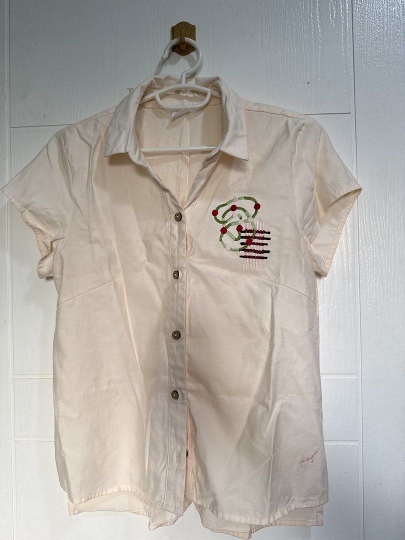 Bayo Embroidered Shirt - Small (Category: Shirts) located in Pasig City. Submitted by pupperiedoo (Listing ID 1422753009, Image 3). Description: - Bayo cream-colored shirt - Size: Small - Features an embroidered design - Short sleeves - Button-down closure - Collared neckline.
