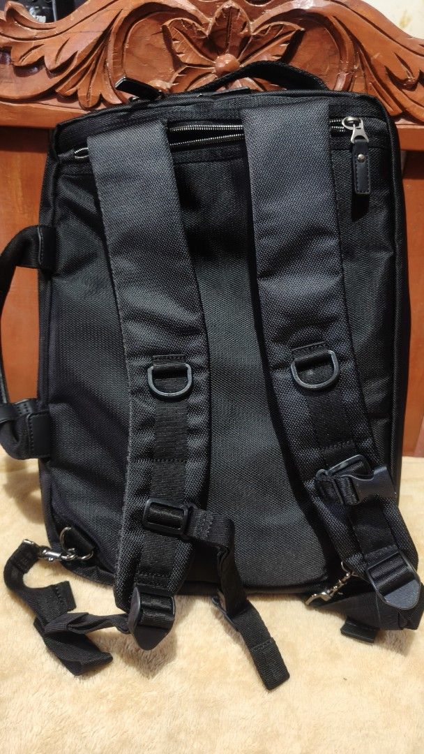 Black Laptop Bag (backpack, shoulder) (Category: Laptop Bags & Sleeves) located in Tanza. Submitted by declutterolshoppe (Listing ID 1422775391, Image 1). Description: - Black laptop bag (backpack, shoulder) - Multiple compartments for organization - Includes a handle and detachable shoulder strap - Sleek design with textured exterior - Zippered closure - Made of durable material - Interior pockets for organization.