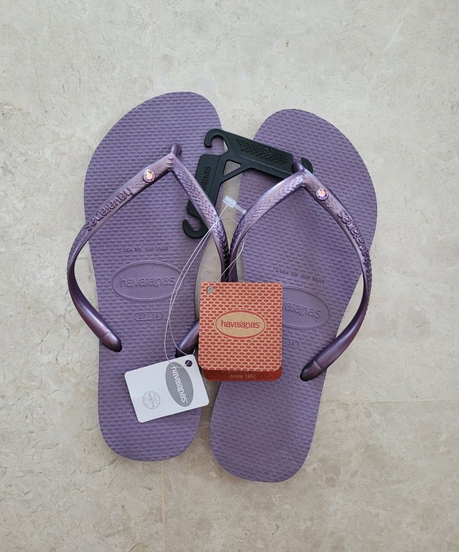 BNWT Havaianas Slim Crystal SW Flip Flops (Category: Flats) located in Singapore. Submitted by monkeyz3127 (Listing ID 1422865973, Image 3). Description: brand new with tags 37/38 via mail only. no meetups postage- $2.80.