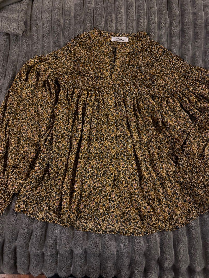 Boho chic flowy floral top bought in Korea (Category: Blouses) located in Quezon City. Submitted by therealtigermom (Listing ID 1422840470, Image 1). Description: Boho chic blouse with smocked front. I would pair this with flare denim or denim shorts and it looks so elegant. RFS-closet clean up.